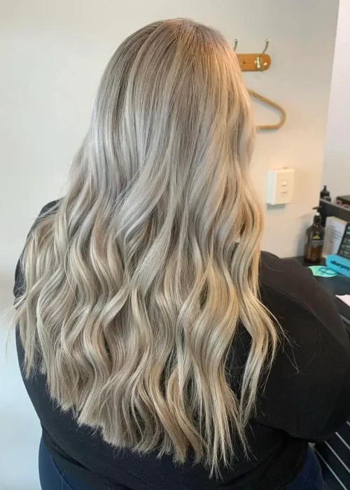 image of a womans blonde hair freshly done in Vogue Hair & Barbers