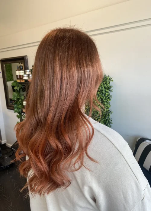 image of a womans copper hair freshly done in Vogue Hair & Barbers